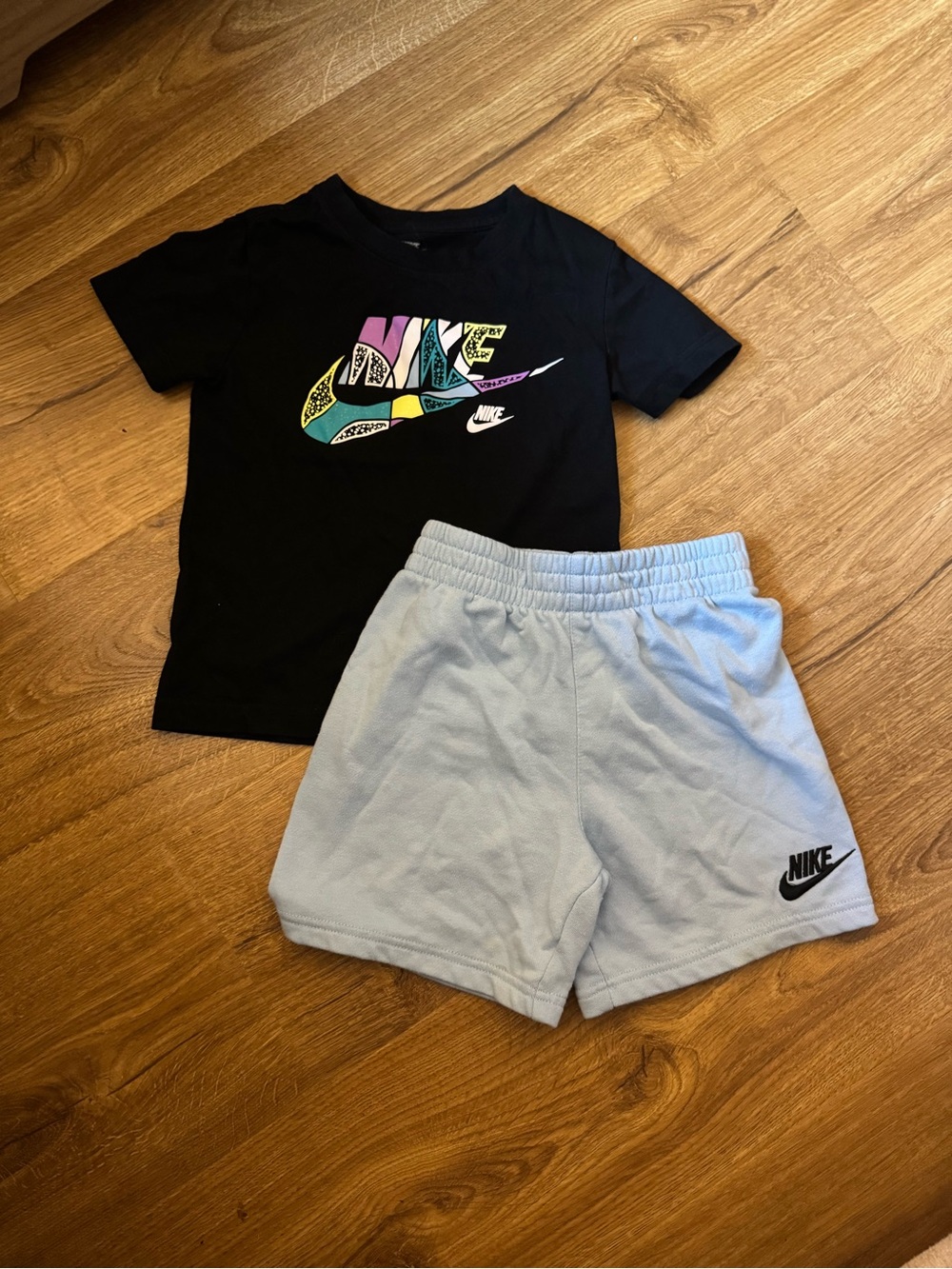 Nike Light Blue Fleece Shorts and Black Shirt (Size 5)